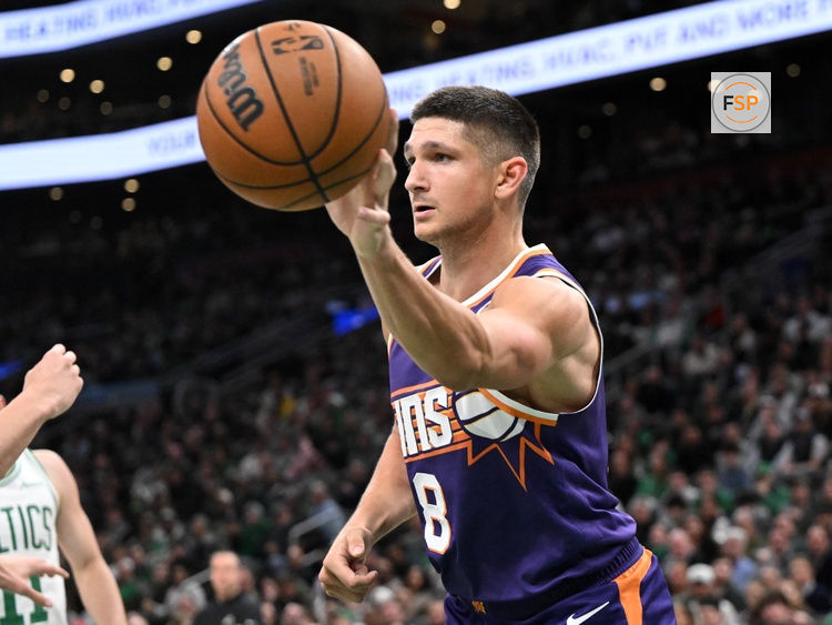 Mar 16, 2026; Boston, Massachusetts, USA; Phoenix Suns guard Grayson Allen (8) passes the ball against the Boston Celtics during the first half at the TD Garden. Credit: Brian Fluharty-Imagn Images