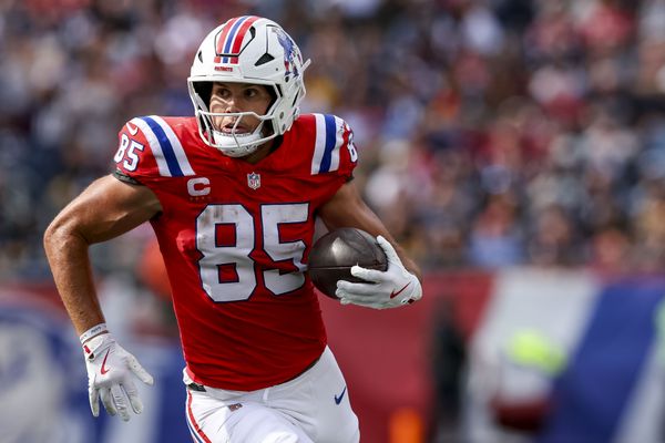 Sep 21, 2025; Foxborough, Massachusetts, USA; New England Patriots tight end Hunter Henry (85) runs the ball during the third quarter at Gillette Stadium. Mandatory Credit: Paul Rutherford-Imagn Images