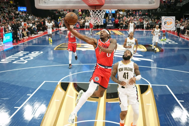 Oct 31, 2025; Inglewood, California, USA; LA Clippers guard Bradley Beal (0) shoots the ball against New Orleans Pelicans guard Saddiq Bey (41) in the second half at Intuit Dome. Credit: Kirby Lee-Imagn Images
