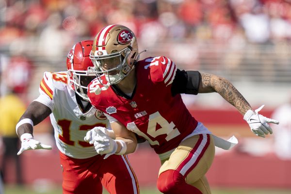 October 20, 2024; Santa Clara, California, USA; San Francisco 49ers wide receiver Ricky Pearsall (14) runs against Kansas City Chiefs safety Nazeeh Johnson (13) during the first quarter at Levi's Stadium. Mandatory Credit: Kyle Terada-Imagn Images