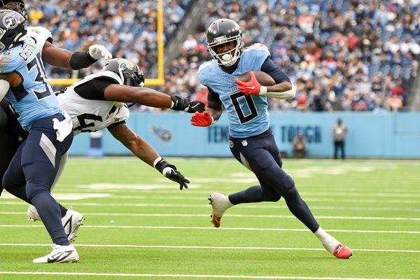 Dec 8, 2024; Nashville, Tennessee, USA;  Tennessee Titans wide receiver Calvin Ridley (0) runs the ball against the Jacksonville Jaguars during the first half at Nissan Stadium. Mandatory Credit: Steve Roberts-Imagn Images