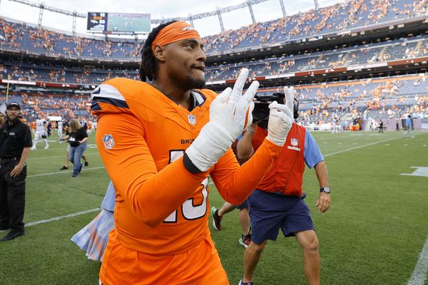 Sep 7, 2025; Denver, Colorado, USA; Denver Broncos linebacker Nik Bonitto (15) reacts after the game at Empower Field at Mile High. Mandatory Credit: Isaiah J. Downing-Imagn Images