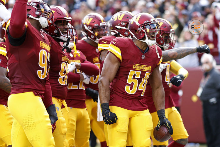 Nov 24, 2024; Landover, Maryland, USA; Washington Commanders linebacker Bobby Wagner (54) celebrates with teammates after recovering a fumble against the Dallas Cowboys during the first half at Northwest Stadium. Credit: Geoff Burke-Imagn Images