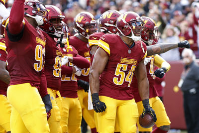 Nov 24, 2024; Landover, Maryland, USA; Washington Commanders linebacker Bobby Wagner (54) celebrates with teammates after recovering a fumble against the Dallas Cowboys during the first half at Northwest Stadium. Mandatory Credit: Geoff Burke-Imagn Images