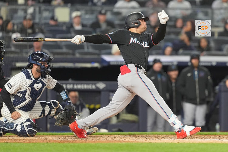 Apr 4, 2026; Bronx, New York, USA;Miami Marlins center fielder Jakob Marsee (87) hits a single against the New York Yankees during the fourth inning at Yankee Stadium. Credit: Gregory Fisher-Imagn Images