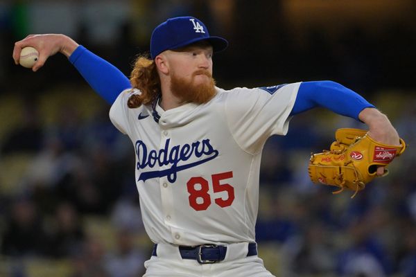 Apr 1, 2025; Los Angeles, California, USA;  Los Angeles Dodgers starting pitcher Dustin May (85) delivers to the plate in the first inning against the Atlanta Braves at Dodger Stadium. Mandatory Credit: Jayne Kamin-Oncea-Imagn Images