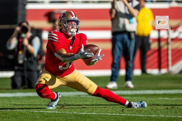 Dec 8, 2024; Santa Clara, California, USA; San Francisco 49ers running back Isaac Guerendo (31) catches a long pass during the first quarter against the Chicago Bears at Levi's Stadium. Credit: Bob Kupbens-Imagn Images