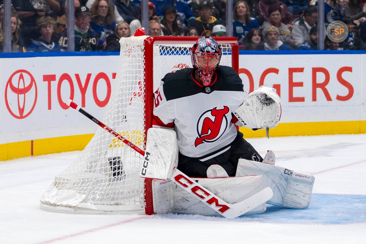 Oct 30, 2024; Vancouver, British Columbia, CAN; New Jersey Devils goalie Jacob Markstrom (25) in the net against the Vancouver Canucks during the second period at Rogers Arena. Credit: Bob Frid-Imagn Images