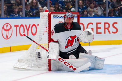 Oct 30, 2024; Vancouver, British Columbia, CAN; New Jersey Devils goalie Jacob Markstrom (25) in the net against the Vancouver Canucks during the second period at Rogers Arena. Mandatory Credit: Bob Frid-Imagn Images