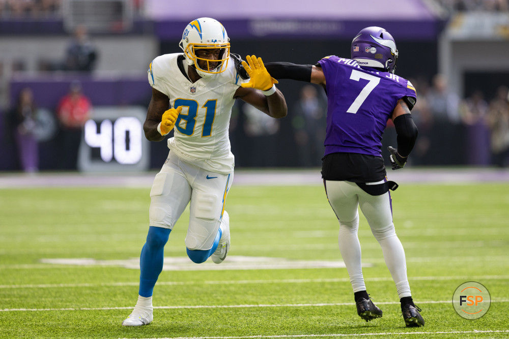 MINNEAPOLIS, MN - SEPTEMBER 24: Los Angeles Chargers wide receiver Mike Williams (81) runs a route while being defended by Minnesota Vikings cornerback Byron Murphy Jr. (7) during the NFL game between the Los Angles Chargers and the Minnesota Vikings on September 24th, 2023, at U.S. Bank Stadium in Minneapolis, MN. (Photo by Bailey Hillesheim/Icon Sportswire)