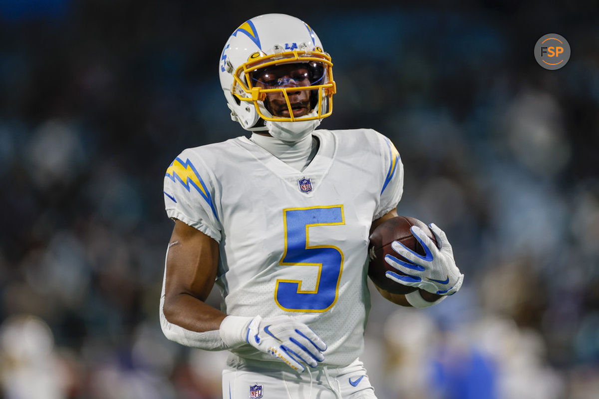 JACKSONVILLE, FL - JANUARY 14: Los Angeles Chargers wide receiver Joshua Palmer (5) runs with the ball during the game between the Los Angeles Chargers and the Jacksonville Jaguars on January 14, 2023 at TIAA Bank Field in Jacksonville, Fl. (Photo by David Rosenblum/Icon Sportswire)