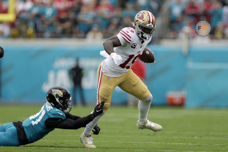 JACKSONVILLE, FL - NOVEMBER 12: San Francisco 49ers wide receiver Deebo Samuel (19) runs with the ball during the game between the San Francisco 49ers and theJacksonville Jaguars on November 12, 2023 at  EverBank Stadium in Jacksonville, Florida. (Photo by David Rosenblum/Icon Sportswire)