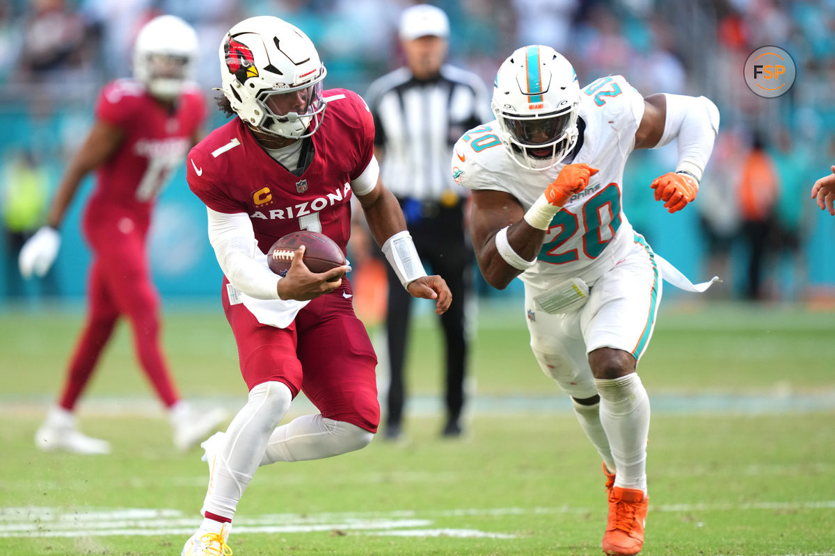 Oct 27, 2024; Miami Gardens, Florida, USA; Arizona Cardinals quarterback Kyler Murray (1) runs for a first down late in the fourth quarter against the Miami Dolphins at Hard Rock Stadium. Credit: Jim Rassol-Imagn Images