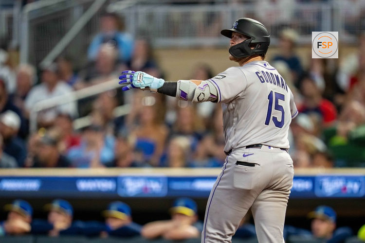 Jun 26, 2026; Minneapolis, Minnesota, USA; Colorado Rockies catcher Hunter Goodman (15) looks on as he hits a two run home run against the Minnesota Twins in the ninth inning at Target Field. Credit: Jesse Johnson-Imagn Images