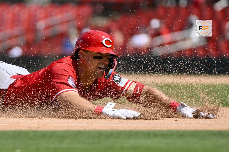 Jun 21, 2025; St. Louis, Missouri, USA;  Cincinnati Reds first baseman Spencer Steer (7) slides in at third base after hitting a triple against the St. Louis Cardinals during the eighth inning at Busch Stadium. Credit: Jeff Curry-Imagn Images
