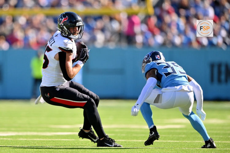 Nov 16, 2025; Nashville, Tennessee, USA; Houston Texans tight end Dalton Schultz (86) runs with the ball after making a catch against the Tennessee Titans during the first quarter at Nissan Stadium. Credit: Steve Roberts-Imagn Images