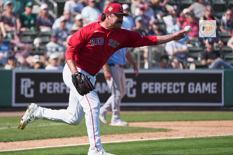 Feb 26, 2026; Fort Myers, Florida, USA;  Boston Red Sox pitcher Payton Tolle (70) throws to first base after fielding a ground ball against the Tampa Bay Rays during the sixth inning at JetBlue Park at Fenway South. Credit: Jim Rassol-Imagn Images