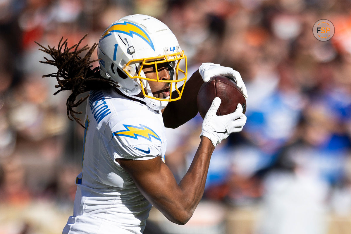 Nov 3, 2024; Cleveland, Ohio, USA; Los Angeles Chargers wide receiver Quentin Johnston (1) makes a reception against the Cleveland Browns during the second quarter at Huntington Bank Field. Credit: Scott Galvin-Imagn Images