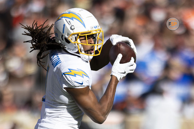 Nov 3, 2024; Cleveland, Ohio, USA; Los Angeles Chargers wide receiver Quentin Johnston (1) makes a reception against the Cleveland Browns during the second quarter at Huntington Bank Field. Credit: Scott Galvin-Imagn Images