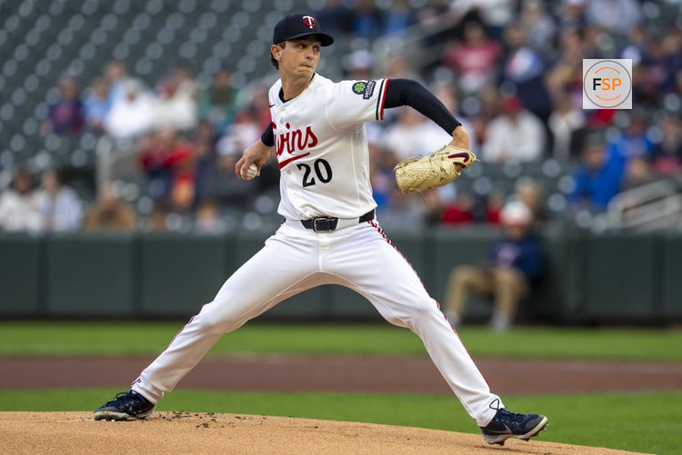 Apr 14, 2026; Minneapolis, Minnesota, USA; Minnesota Twins starting pitcher Mick Abel (20) delivers a pitch against the Boston Red Sox in the first inning at Target Field. Credit: Jesse Johnson-Imagn Images