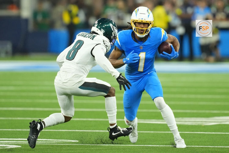 Dec 8, 2025; Inglewood, California, USA; Los Angeles Chargers wide receiver Quentin Johnston (1) runs against Philadelphia Eagles cornerback Adoree' Jackson (8) in the first half at SoFi Stadium. Credit: Kirby Lee-Imagn Images