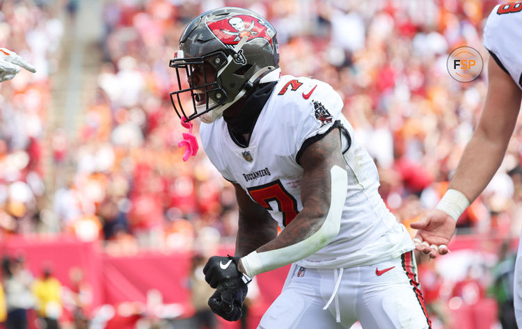 Sep 22, 2024; Tampa, Florida, USA; Tampa Bay Buccaneers running back Bucky Irving (7) celebrates during the first half against the Denver Broncos at Raymond James Stadium. Credit: Kim Klement Neitzel-Imagn Images