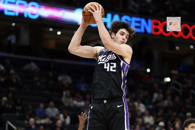 Feb 1, 2026; Washington, District of Columbia, USA; Sacramento Kings center Maxime Raynaud (42) grabs a rebound during the first half against the Washington Wizards at Capital One Arena. Credit: Daniel Kucin Jr.-Imagn Images
