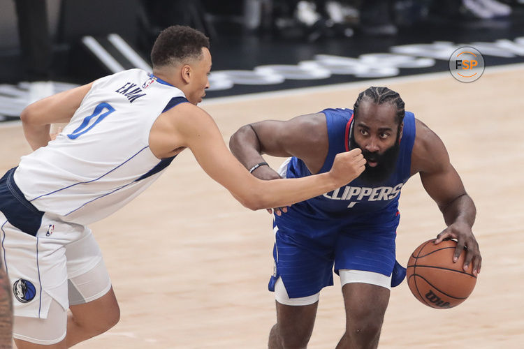 LOS ANGELES, CA - APRIL 21: LA Clippers guard James Harden (1) dribbles on Dallas Mavericks guard Dante Exum (0) during game 1 of the first round of the NBA Western Conference Playoffs between the Dallas Mavericks and the LA Clippers on April 21, 2024 at Crypto.com Arena in Los Angeles, CA. (Photo by Jevone Moore/Icon Sportswire)