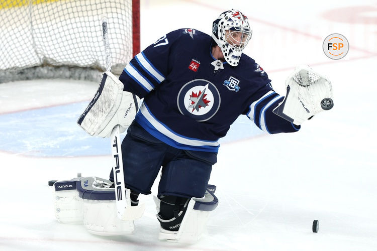 Apr 6, 2026; Winnipeg, Manitoba, CAN; Winnipeg Jets goaltender Connor Hellebuyck (37) warms up before a game against the Seattle Kraken at Canada Life Centre. Credit: James Carey Lauder-Imagn Images