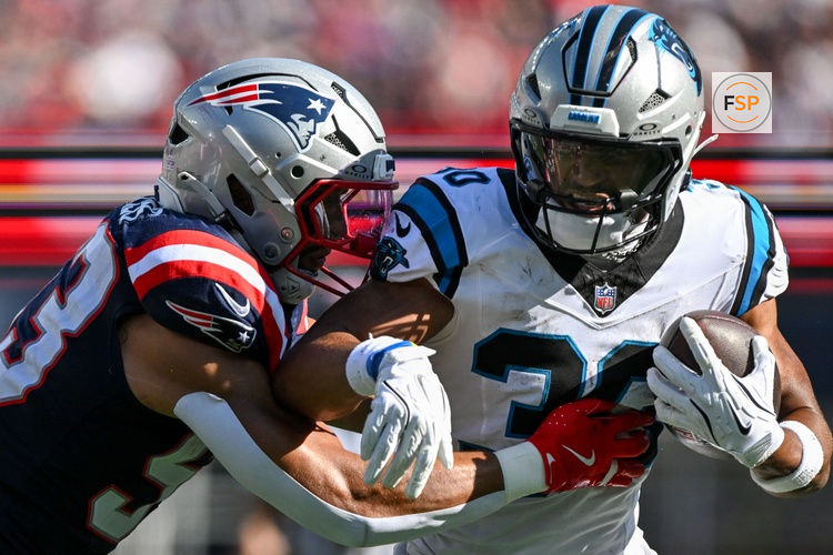 Sep 28, 2025; Foxborough, Massachusetts, USA; New England Patriots linebacker Christian Elliss (53) tackles Carolina Panthers running back Chuba Hubbard (30) during the second half at Gillette Stadium. Credit: Brian Fluharty-Imagn Images