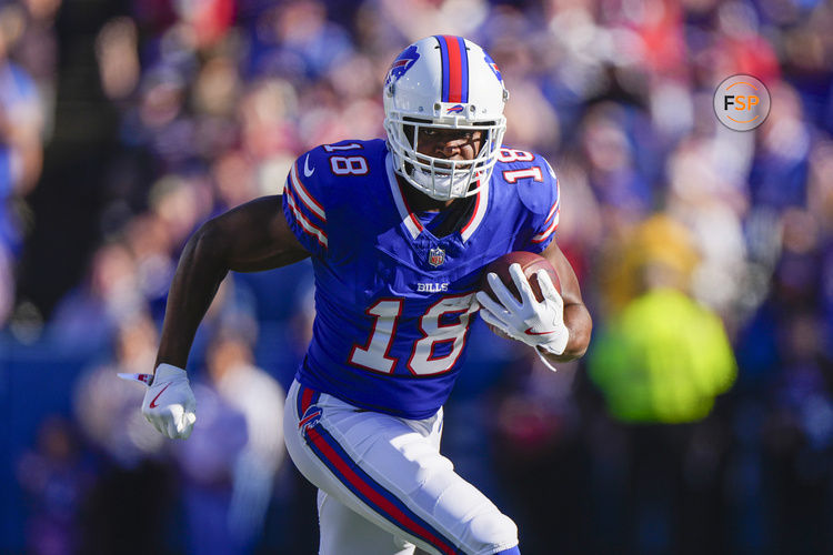 Oct 20, 2024; Orchard Park, New York, USA; Buffalo Bills wide receiver Amari Cooper (18) runs with the ball after making a catch against the Tennessee Titans during the second half at Highmark Stadium. Credit: Gregory Fisher-Imagn Images