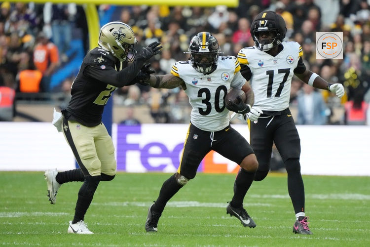 Oct 25, 2026; Paris, FRA;  New Orleans Saints safety Justin Reid (21) makes a tackle on Pittsburgh Steelers running back Jaylen Warren (30) during the second quarter at Stade de France.  Credit: Kirby Lee-Imagn Images