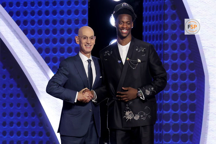 Jun 23, 2026; New York, NY, USA; AJ Dybantsa poses for photos with NBA commissioner Adam Silver after being selected first overall by the Washington Wizards during the 2026 NBA Draft at Barclays Center. Credit: Brad Penner-Imagn Images
