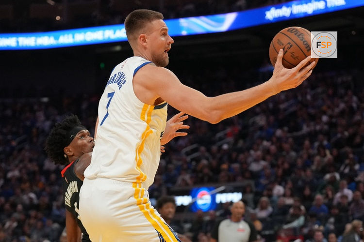 Apr 5, 2026; San Francisco, California, USA; Golden State Warriors forward Kristaps Porzingis (7) catches a pass against the Houston Rockets in the second quarter at the Chase Center. Credit: Cary Edmondson-Imagn Images