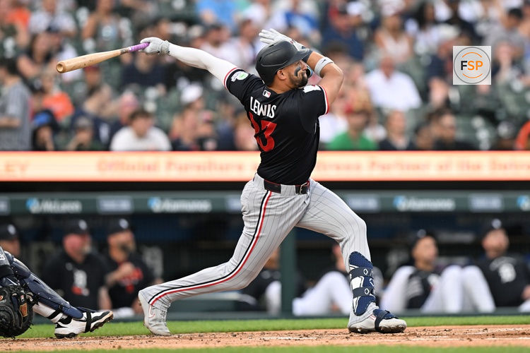 Jun 10, 2026; Detroit, Michigan, USA;  Minnesota Twins first baseman Royce Lewis (23) hits a solo home run against the Detroit Tigers in the second inning at Comerica Park. Credit: Lon Horwedel-Imagn Images