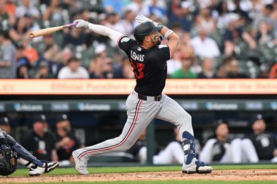 Jun 10, 2026; Detroit, Michigan, USA;  Minnesota Twins first baseman Royce Lewis (23) hits a solo home run against the Detroit Tigers in the second inning at Comerica Park. Mandatory Credit: Lon Horwedel-Imagn Images