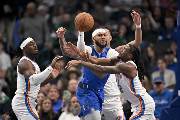 Jan 14, 2025; Milwaukee, Wisconsin, USA; Milwaukee Bucks guard Damian Lillard (0) takes a shot against Sacramento Kings forward Keegan Murray (13) in the third quarter at Fiserv Forum. Mandatory Credit: Benny Sieu-Imagn Images