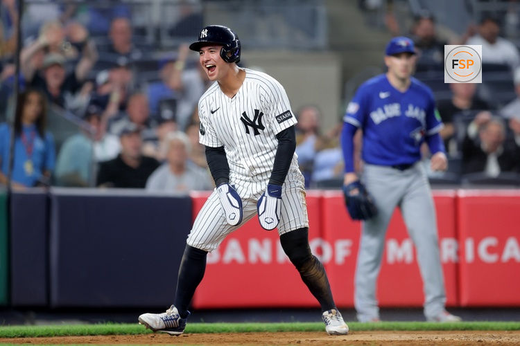 May 18, 2026; Bronx, New York, USA; New York Yankees shortstop Anthony Volpe (11) reacts after scoring a run against the Toronto Blue Jays on a sacrifice fly by Yankees catcher J.C. Escarra (not pictured) during the fourth inning at Yankee Stadium. Credit: Brad Penner-Imagn Images