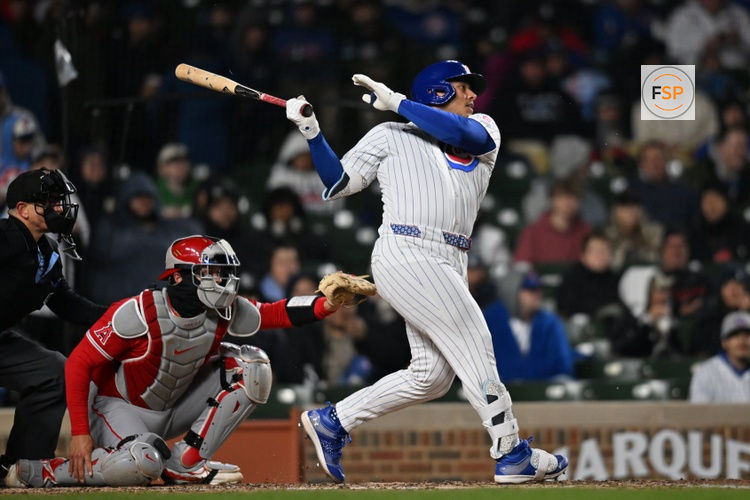 Mar 31, 2026; Chicago, Illinois, USA; Chicago Cubs designated hitter Moises Ballesteros (25) hits a single against the Los Angeles Angels during the fifth inning at Wrigley Field. Credit: Patrick Gorski-Imagn Images