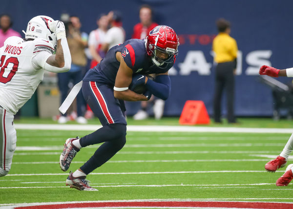 HOUSTON, TX - NOVEMBER 19:  Houston Texans wide receiver Robert Woods (2) carries the ball in the first quarter during the NFL game between the Arizona Cardinals and Houston Texans on November 19, 2023 at NRG Stadium in Houston, Texas.  (Photo by Leslie Plaza Johnson/Icon Sportswire)