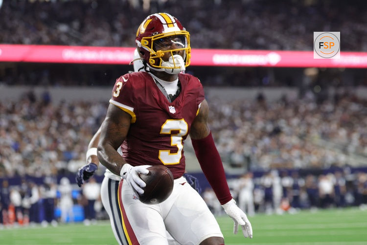 Sep 20, 2026; Arlington, Texas, USA;  Washington Commanders wide receiver Stefon Diggs (3) catches a four-yard pass for a touchdown thrown by quarterback Jayden Daniels (not pictured) against the Dallas Cowboys during the first half at AT&T Stadium.  Credit: Kevin Jairaj-Imagn Images