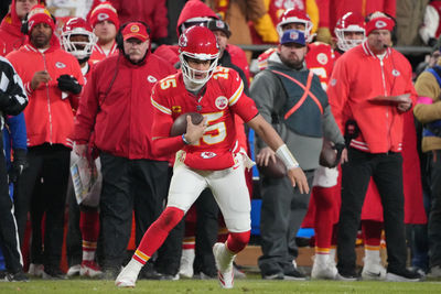 Jan 18, 2025; Kansas City, Missouri, USA; Kansas City Chiefs quarterback Patrick Mahomes (15) runs the ball against the Houston Texans during the fourth quarter of a 2025 AFC divisional round game at GEHA Field at Arrowhead Stadium. Mandatory Credit: Denny Medley-Imagn Images