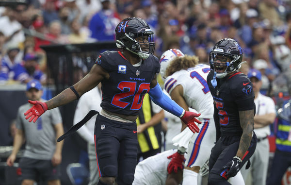 Oct 6, 2024; Houston, Texas, USA; Houston Texans safety Jimmie Ward (20) reacts after making a tackle during the second quarter against the Buffalo Bills at NRG Stadium. Mandatory Credit: Troy Taormina-Imagn Images