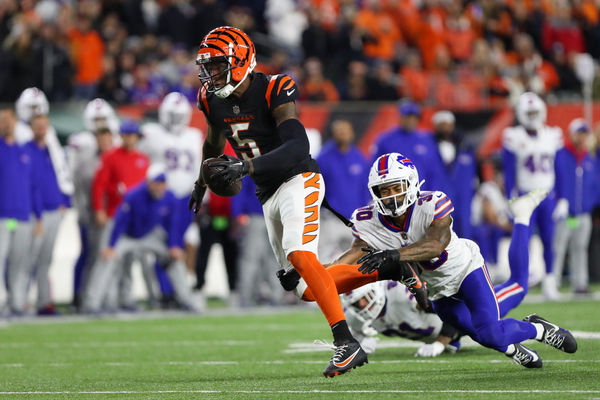 CINCINNATI, OH - NOVEMBER 05: Cincinnati Bengals wide receiver Tee Higgins (5) carries the ball during the game against the Buffalo Bills and the Cincinnati Bengals on November 5, 2023, at Paycor Stadium in Cincinnati, OH. (Photo by Ian Johnson/Icon Sportswire)