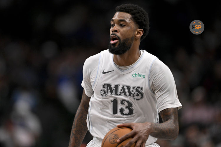 Mar 9, 2025; Dallas, Texas, USA; Dallas Mavericks forward Naji Marshall (13) brings the ball up court against the Phoenix Suns during the second half at the American Airlines Center. Credit: Jerome Miron-Imagn Images