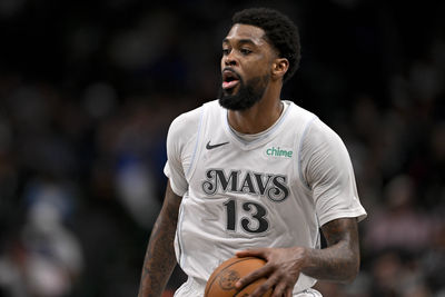 Mar 9, 2025; Dallas, Texas, USA; Dallas Mavericks forward Naji Marshall (13) brings the ball up court against the Phoenix Suns during the second half at the American Airlines Center. Mandatory Credit: Jerome Miron-Imagn Images