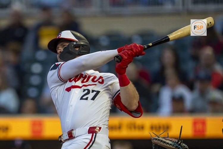 May 12, 2026; Minneapolis, Minnesota, USA; Minnesota Twins catcher Ryan Jeffers (27) hits a two run home run against the Miami Marlins in the fifth inning at Target Field. Credit: Jesse Johnson-Imagn Images