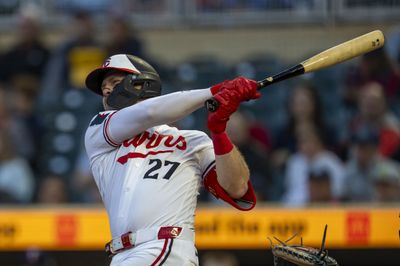 May 12, 2026; Minneapolis, Minnesota, USA; Minnesota Twins catcher Ryan Jeffers (27) hits a two run home run against the Miami Marlins in the fifth inning at Target Field. Mandatory Credit: Jesse Johnson-Imagn Images