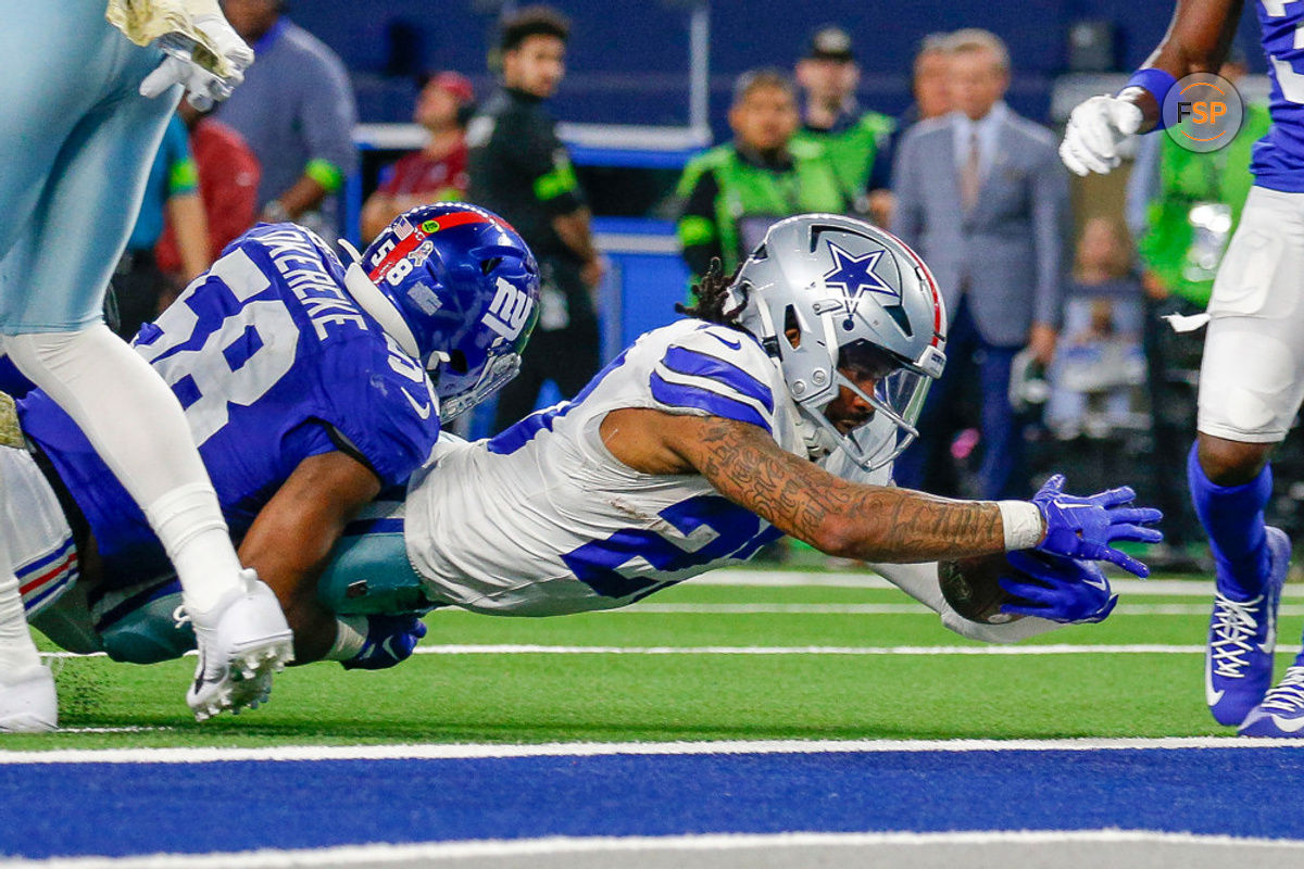 ARLINGTON, TX - NOVEMBER 12: Dallas Cowboys running back Rico Dowdle (23) stretches but is just short of a touchdown during the game between the Dallas Cowboys and New York Giants on November 12, 2023 at AT&T Stadium in Arlington, TX. (Photo by Andrew Dieb/Icon Sportswire)