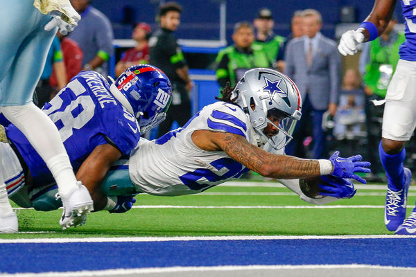 ARLINGTON, TX - NOVEMBER 12: Dallas Cowboys running back Rico Dowdle (23) stretches but is just short of a touchdown during the game between the Dallas Cowboys and New York Giants on November 12, 2023 at AT&T Stadium in Arlington, TX. (Photo by Andrew Dieb/Icon Sportswire)